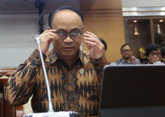 Ready for questions: Then communications and information minister Budi Arie Setiadi attends a meeting with the House of Representatives Commission I overseeing information at the Senayan legislative complex in Jakarta on Sept. 10, 2024. (Antara/Muhammad Iqbal)