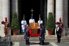 Pallbearers carry the coffin of Pope Francis on April 26, 2025, during his funeral at the Papal Basilica of Saint Mary Major (Santa Maria Maggiore) in Rome.