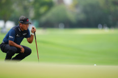 K.J. Choi lines up his putt on the first hole on April 6, 2025, during the third round of the James Hardie Pro-Football Hall of Fame Invitational at The Old Course at Broken Sound in Boca Raton, Florida.