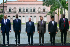 (L to R) Russia's Foreign Minister Sergey Lavrov, Ethiopia's Minister of Foreign Affairs Gedion Timothewos, Brazil's Foreign Minister Mauro Vieira, China's Foreign Minister Wang Yi, Indonesia's Foreign Minister Sugiono and South Africa's Minister of Foreign Affairs Ronald Lamola pose for the family photo at Rio de Janeiro's Itamaraty Palace during the first meeting of BRICS Foreign Ministers in Rio de Janeiro, Brazil, on April 28, 2025. Senior diplomats from BRICS countries met on Monday in Brazil to present a united front in the face of threats emerging from US President Donald Trump's aggressive trade policies. 