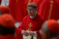 Cardinal Luis Antonio Tagle attends a mass at St Peter's basilica in The Vatican on April 30, 2025. 