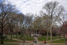 Students walk at the campus of Harvard University in Cambridge, Massachusetts, US on April 15, 2025. 