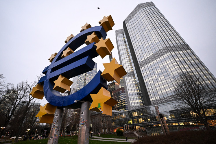 The Euro currency sign is seen in front of the former European Central Bank building on Dec. 11, 2024 in Frankfurt am Main, western Germany.