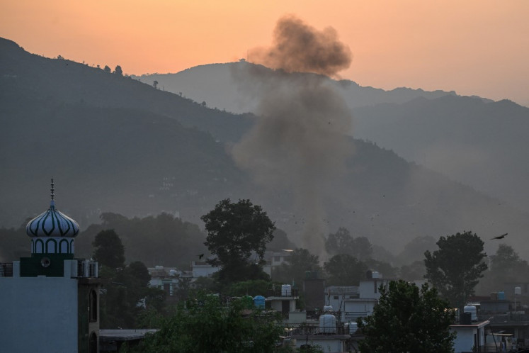 Smoke rises on Wednesday in the town of Poonch in Jammu, division, Jammu and Kashmir, India. India fired missiles at Pakistani territory early on Wednesday, killing at least eight people, according to Pakistan, which said it had begun retaliating in a major escalation between the nuclear-armed rivals.