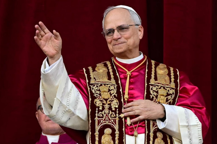 Newly elected Pope Leo XIV, Robert Prevost from the main central loggia balcony of the St Peter's Basilica for the first time, after the cardinals ended the conclave, in The Vatican, on May 8, 2025. 