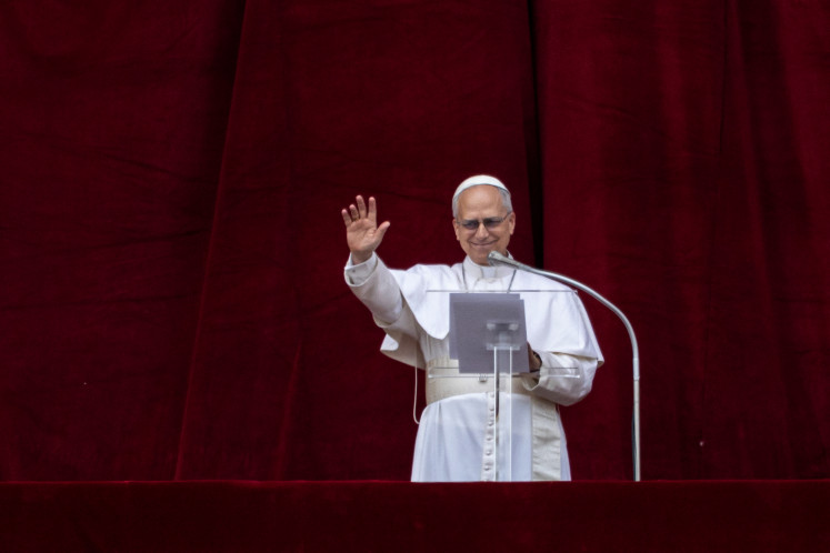 Pope Leo XIV appears on the central balcony (Loggia delle Benedizioni) of St. Peter's Basilica, on the day he leads Regina Caeli prayer, at the Vatican, May 11, 2025.