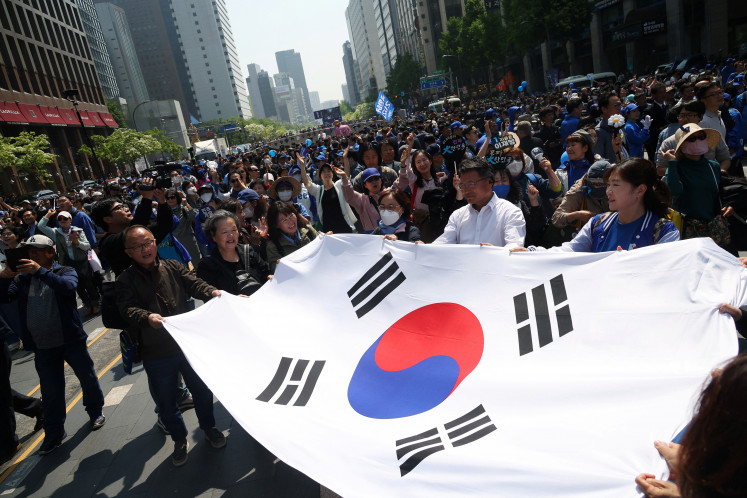 Supporters for Lee Jae-myung, the presidential candidate for South Korea's Democratic Party, cheers after an election campaign rally in Seoul, South Korea, May 12, 2025.