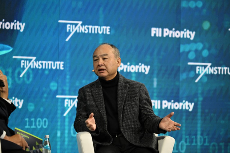 CEO of SoftBank Masayoshi Son speaks during the Future Investment Initiative (FII) Institute Priority Summit in Miami Beach, Florida, US, on Feb. 21, 2025.