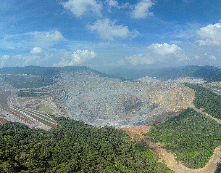 Massive operation: The open pit Batu Hijau mine, operated by Amman Mineral Nusa Tenggara in West Sumbawa, West Nusa Tenggara, is seen in this undated photo.