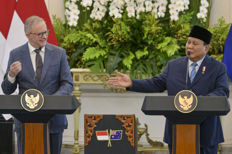 President Prabowo Subianto (right) and Australian Prime Minister Anthony Albanese attend a joint press conference at the Merdeka Palace in Jakarta on May 15, 2025.
