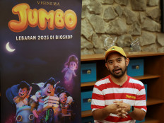 Jumbo movie director Ryan Adriandhy gestures during an interview with Reuters at his office in Jakarta on May 6, 2025.