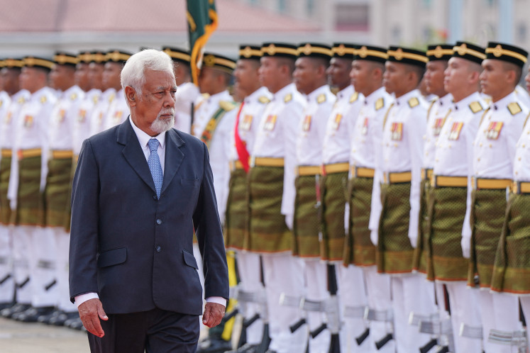Timor-Leste Prime Minister Xanana Gusmao inspects an honor guard during a welcoming ceremony at the Malaysian prime minister office in Putrajaya on Dec. 2, 2024.