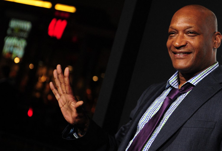 Actor Tony Tod gestures for the cameras ahead of a Los Angeles Special Screening of the film “Final Destination 5“ on August 10, 2011 in Hollywood. Shot in 3D, 