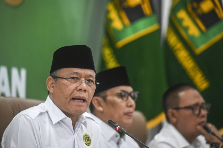 Muhamad Mardiono (left), acting chair of the United Development Party (PPP), speaks on May 22, 2024, at the PPP headquarters in Menteng, Central Jakarta, during a press briefing on the party's response to the Constitutional Court's decision on its election petitions. The court rejected all 18 petitions the party had filed, eliminating its chance to hold a seat at the House of Representatives for the next five years. 