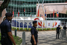 Personnel secure the vicinity of KLCC Park ahead of the 46th ASEAN Summit in Kuala Lumpur on May 25, 2025.