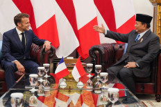 France's President Emmanuel Macron (left) meets with President Prabowo Subianto at Merdeka Palace in Jakarta on May 28, 2025. 