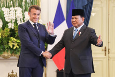 President Prabowo Subianto (right) shakes hands on May 28, 2025, with French President Emmanuel Macron during their meeting at the Presidential Palace Complex in Central Jakarta.
