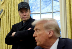 Elon Musk listens to US President Donald Trump speak in the Oval Office of the White House in Washington, D.C., United States on February 11, 2025.
