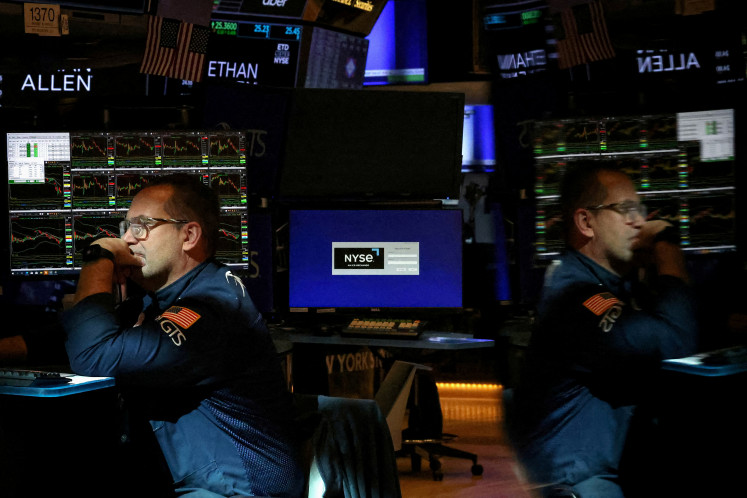 A trader works on the floor at the New York Stock Exchange (NYSE) in New York City, US, on April 9, 2025.