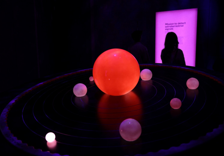 People visit the exhibition 'Space: Could Life Exist Beyond Earth?' at the Natural History Museum in London, Britain, on May 16, 2025.