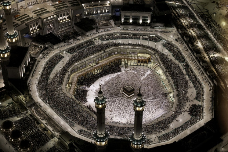 Muslim worshippers gather to pray around the Kaaba, Islam's holiest shrine, at the Grand Mosque complex in the holy city of Mecca on June 1, 2025 ahead of the annual haj pilgrimage.