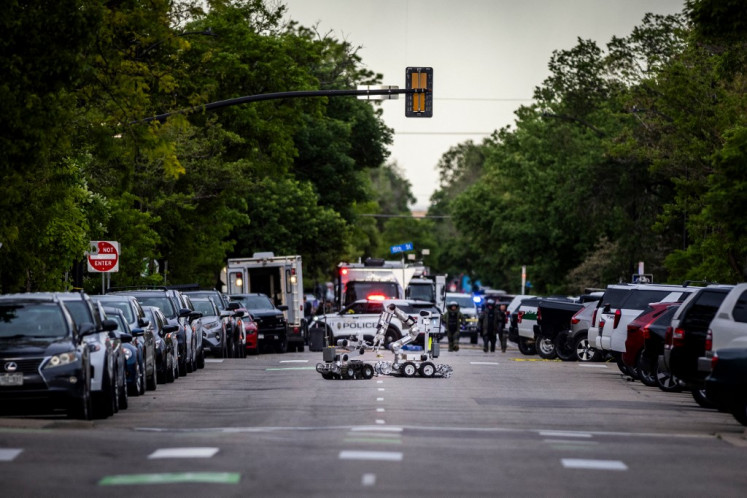 Anti-bomb robotics are put into place following an incident involving multiple injuries that the FBI is investigating as an act of terror on June 1, 2025 in Boulder, Colorado. 
