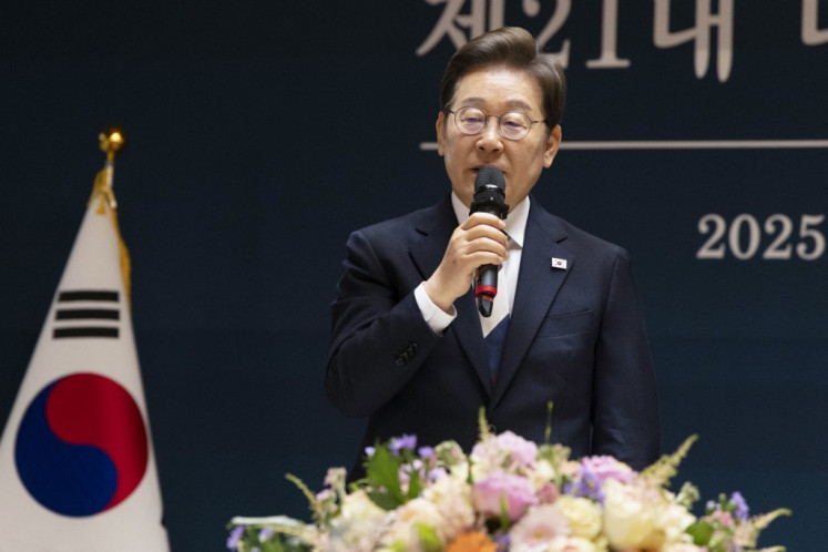South Korea's President Lee Jae-Myung talks during a meeting with party leaders after the presidential inauguration ceremony at the National Assembly in Seoul on June 4, 2025. 