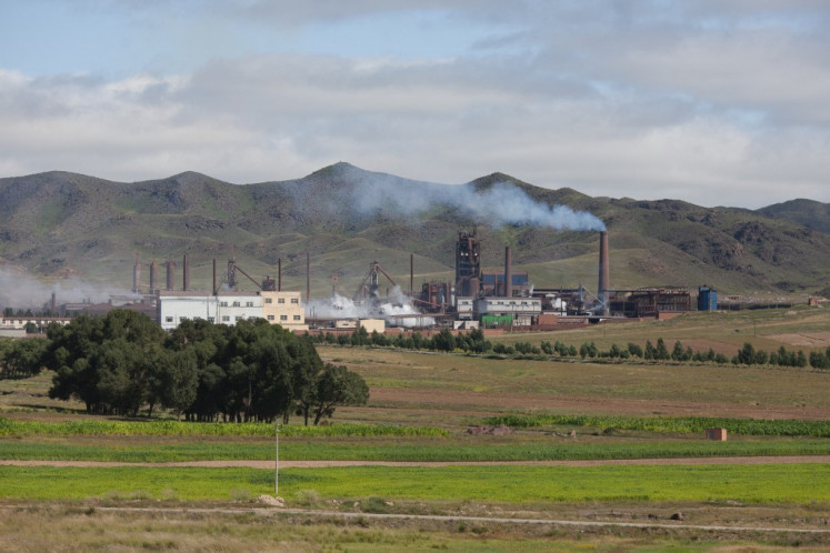 A photo taken on August 20, 2012 shows a general view of a rare earth refinery north of the inner Mongolian city of Baotou.  On the edge of the Chinese city of Baotou, a 10-square-kilometer lake is blackened by pollution from factories processing rare earths, elements essential for the production of mobile phones and computers. China produces more than 95 percent of the world's rare earths, 17 elements crucial for making a range of hi-tech products. Two-thirds of that is processed in mineral-rich Baotou on the edge of the Gobi desert.  