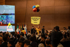 Peaceful protest at minerals expo urges protection for Raja Ampat