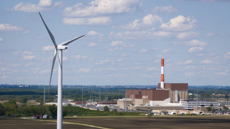 An aerial view shows a wind power turbine near Constellation Energy's LaSalle Clean Energy Center nuclear power plant on May 23, 2025, near Marseilles, Illinois, US.