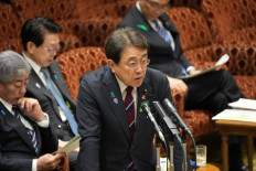 Japan's Economic Revitalization Minister Ryosei Akazawa, the country's envoy for tariff talks with the US, answers questions during a parliamentary committee session in Tokyo on April 21, 2025.