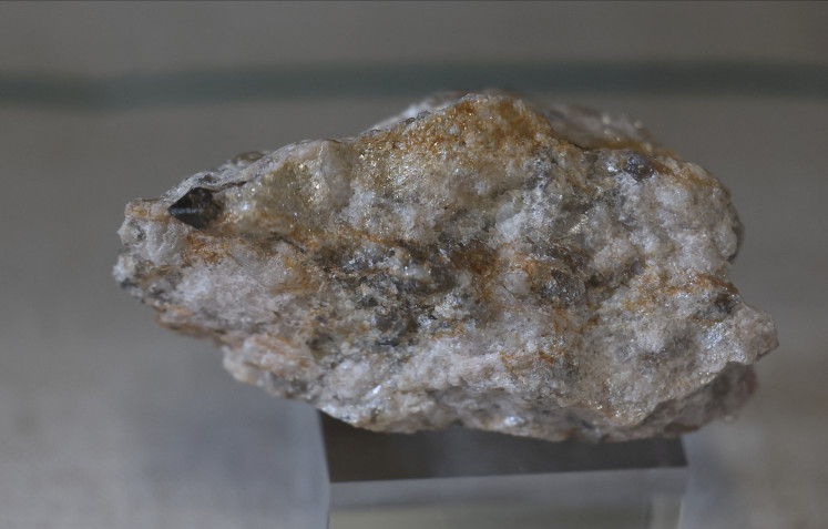 A sample of xenotime, a main ore mineral containing rare earth elements, is displayed at the Natural History Museum in London on June 6, 2025. 