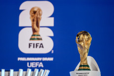 The FIFA World Cup trophy is displayed ahead of the draw for the 2026 FIFA World Cup European qualifiers at the FIFA headquarters in Zurich, Switzerland on Dec. 13, 2024.