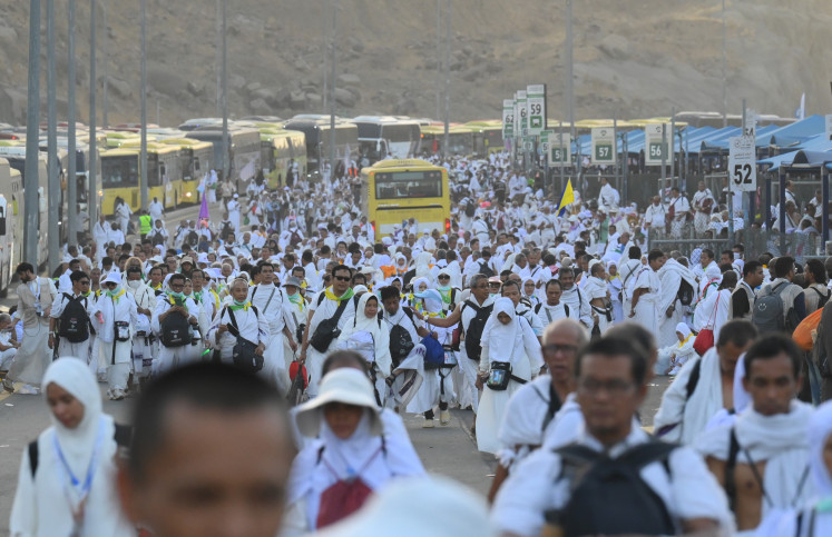 Unexpected journey: Indonesian pilgrims walk on Friday from Muzdalifah to Mina in Saudi Arabia.