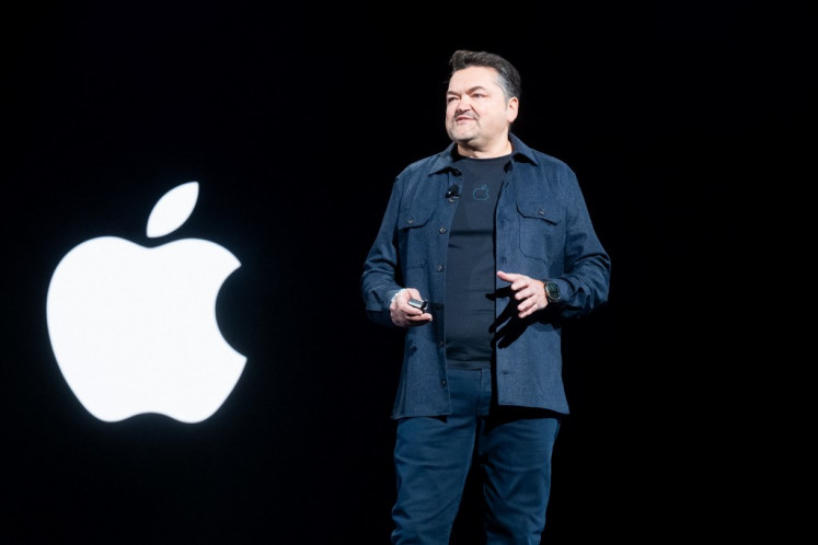 Apple Senior Director of Machine Learning and AI, Benoit Dupin speaks at AWS re:Invent 2024, a conference hosted by Amazon Web Services, at The Venetian Las Vegas on Dec. 3, 2024 in Las Vegas, Nevada, US. (Photo by Noah Berger / GETTY IMAGES NORTH AMERICA / Getty Images via AFP)