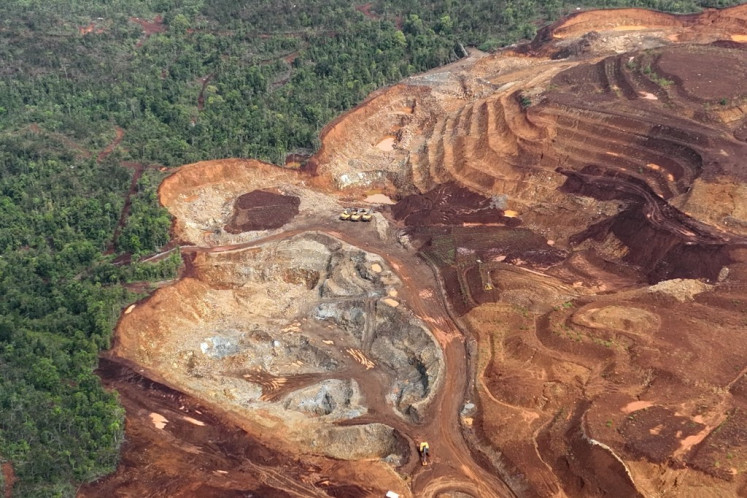 This aerial handout picture taken on December 22, 2024 and released on January 31, 2025 by Auriga Nusantara shows a general view of deforestation at an area on Gag Island in Raja Ampat, Southwest Papua province. 