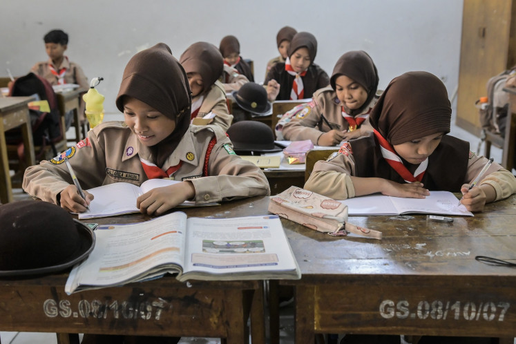 Students attend a class at SDN Grogol Selatan 08 state elementary school on May 28, 2025, in South Jakarta.
