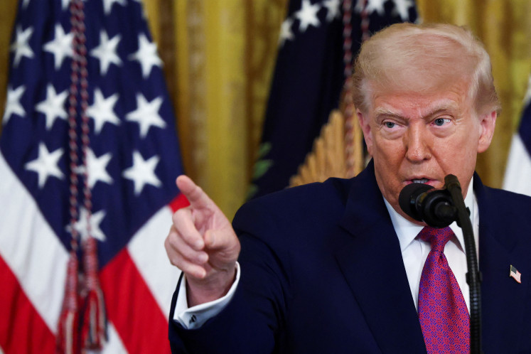 U.S. President Donald Trump speaks before signing a resolution approved by Congress to rescind the EPA's 2023 approval of California's plans to require a rising number of zero-emission heavy-duty trucks, and another resolution on California's low-NOx, or low-nitrogen oxide, regulation for heavy-duty highway and off-road vehicles and engines, at the White House in Washington, D.C., U.S., June 12.