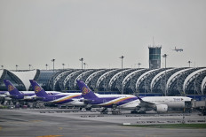 Thai Airways fleet are docked at the main terminal from inside the new SAT-1 terminal at Suvarnabhumi International Airport in Bangkok on September 25, 2023.