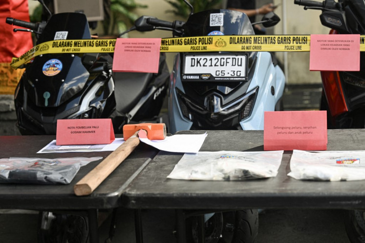 Evidence seized from the suspects allegedly involved in the murder of an Australian man at a Bali villa are seen on display during a press conference at the Badung district police station in Badung regency, Bali on June 18, 2025. 