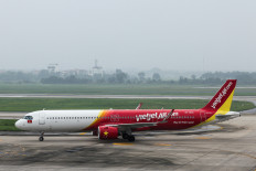 An airplane of VietJet Airline is seen at Noi Bai International Airport, in Hanoi on May 28, 2025.