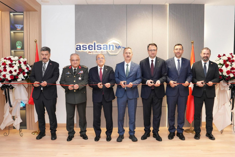 Secretary of Turkish Defense Industries Haluk Gorgun (center) and Aselsan chief executive officer and president Ahmet Akyol (third right) pose with other dignitaries on June 13, 2025, during a ceremony to open the Turkish defense company in Jakarta. Aselan has been collaborating with more than 10 local companies in various projects.
