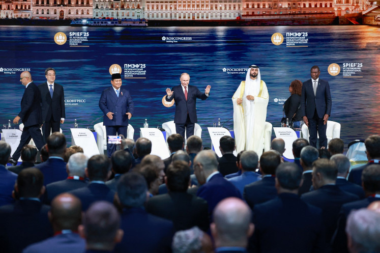 China's Vice Premier Ding Xuexiang (from left), President Prabowo Subianto, Russia's President Vladimir Putin, Bahrain's National Security Advisor Sheikh Nasser bin Hamad Al Khalifa and South Africa's Deputy President Paul Mashatile attend a plenary session of the St. Petersburg International Economic Forum (SPIEF) in Saint Petersburg, Russia, on June 20, 2025.