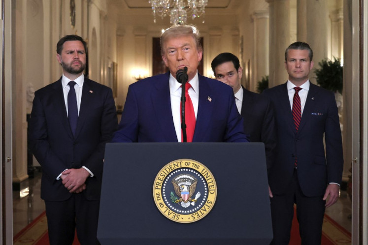 US President Donald Trump addresses the nation, alongside US Vice President JD Vance (left), US Secretary of State Marco Rubio (2nd right) and US Secretary of Defense Pete Hegseth (right), from the White House in Washington, DC on June 21, 2025, following the announcement that the US bombed nuclear sites in Iran. 