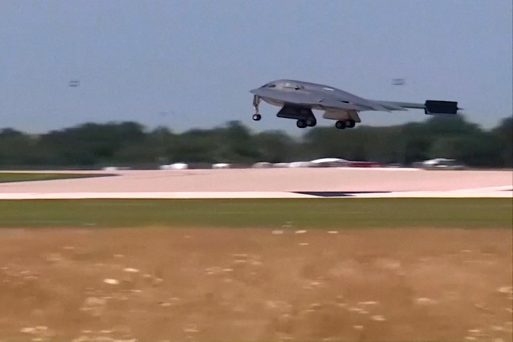 A US Air Force B-2 stealth bomber returns after the US attacked key Iranian nuclear sites, at Whiteman Air Force Base, Missouri, US, June 22, 2025 in a still image from video.