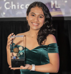 Literary achievement: Anselma Widha Prihandita poses for a photo while holding her trophy during the Nebula Awards ceremony in Kansas City, Missouri, the United States, on June 7, 2025. She is the first Indonesian writer to be nominated for and win the prestigious award.