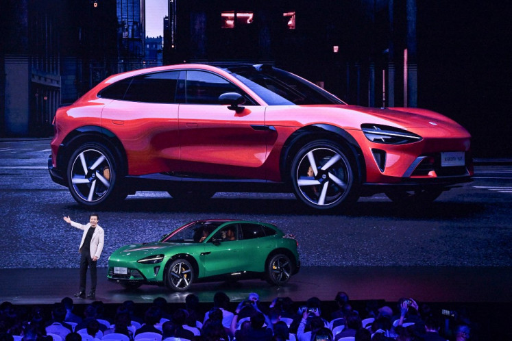 Lei Jun, co-founder and CEO of Xiaomi, speaks during the launch of the Xiaomi YU7 SUV car in Beijing on May 22, 2025. 
