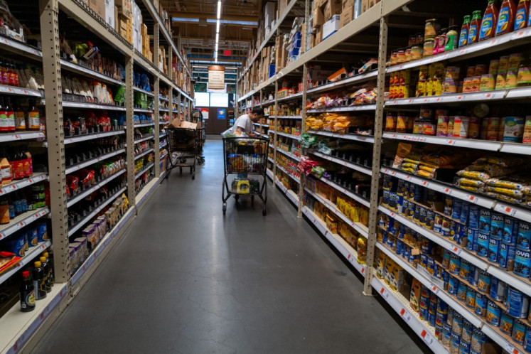 People shop at a grocery store in Brooklyn on May 13, 2025, in New York City, United States.