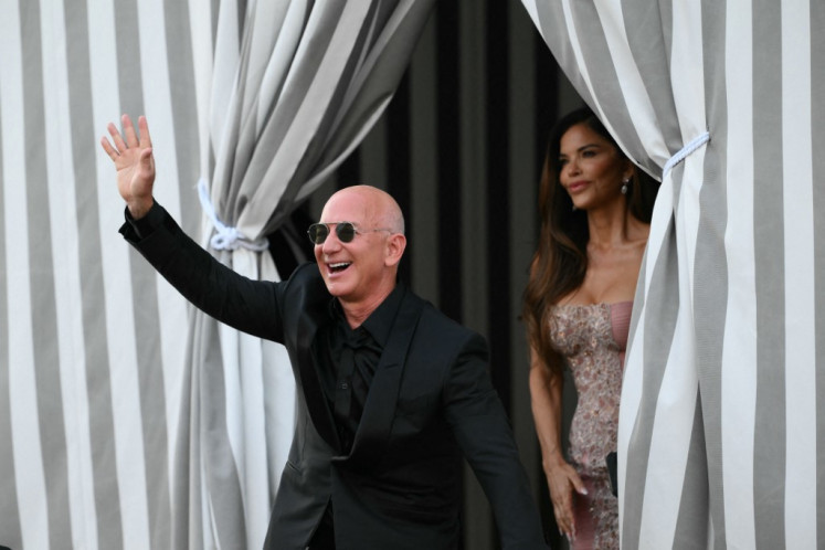 Amazon's founder Jeff Bezos and spouse Lauren Sanchez Bezos leave the Aman Hotel on the third day of their wedding festivities, in Venice on June 28, 2025. 