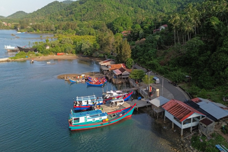 Wooden boats used by residents of the remote Pulo Aceh district to cross to Banda Aceh in mainland Sumatra are seen on June 26 in Aceh Besar, Aceh.